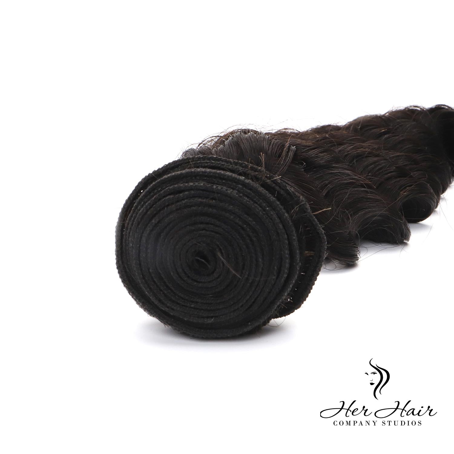 Brazilian Deep Wave hair bundle from Her Hair Company, showing luxurious deep wave texture and natural dark brown color.