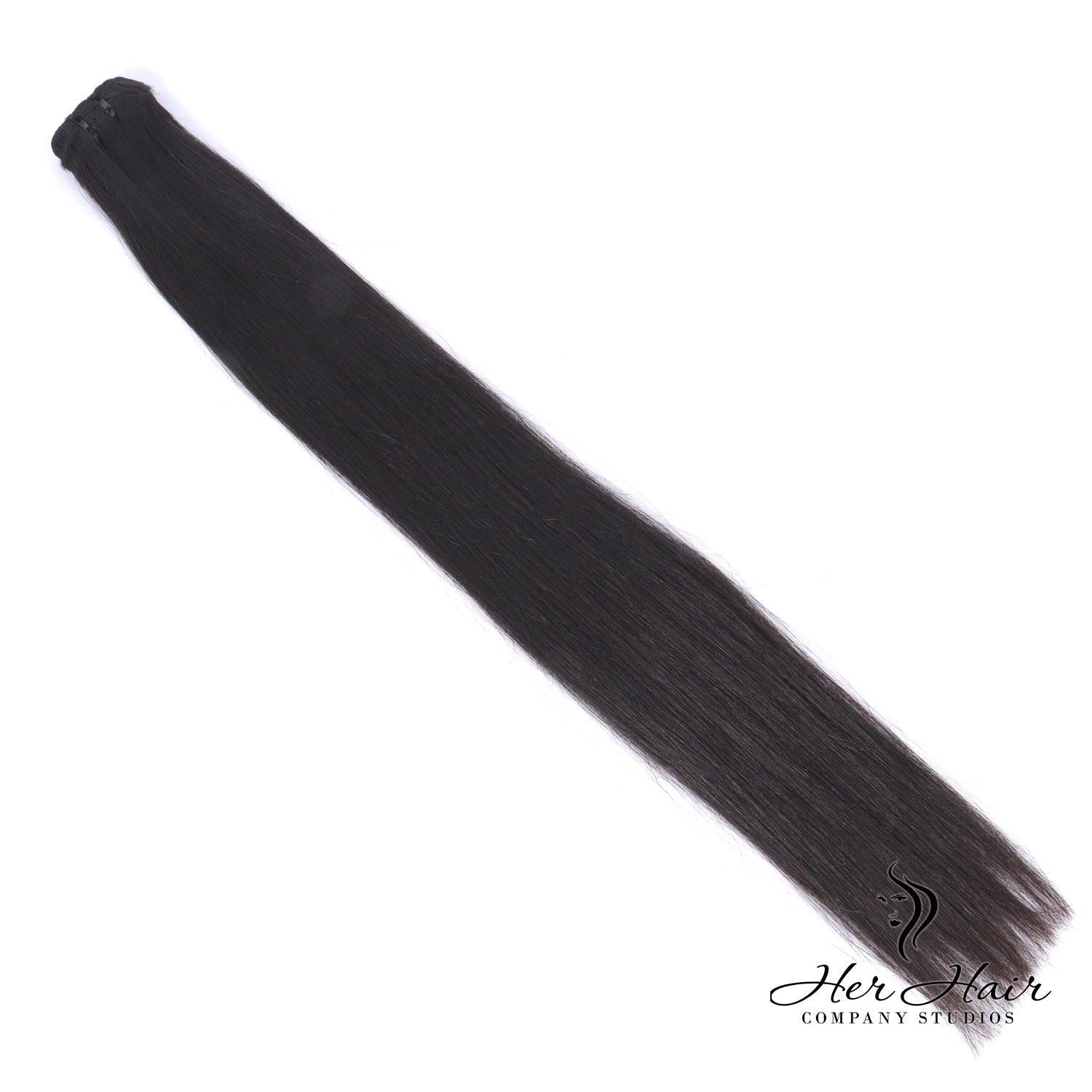 Burmese raw straight hair bundle from Her Hair Company, showing smooth, natural black hair with a straight texture.