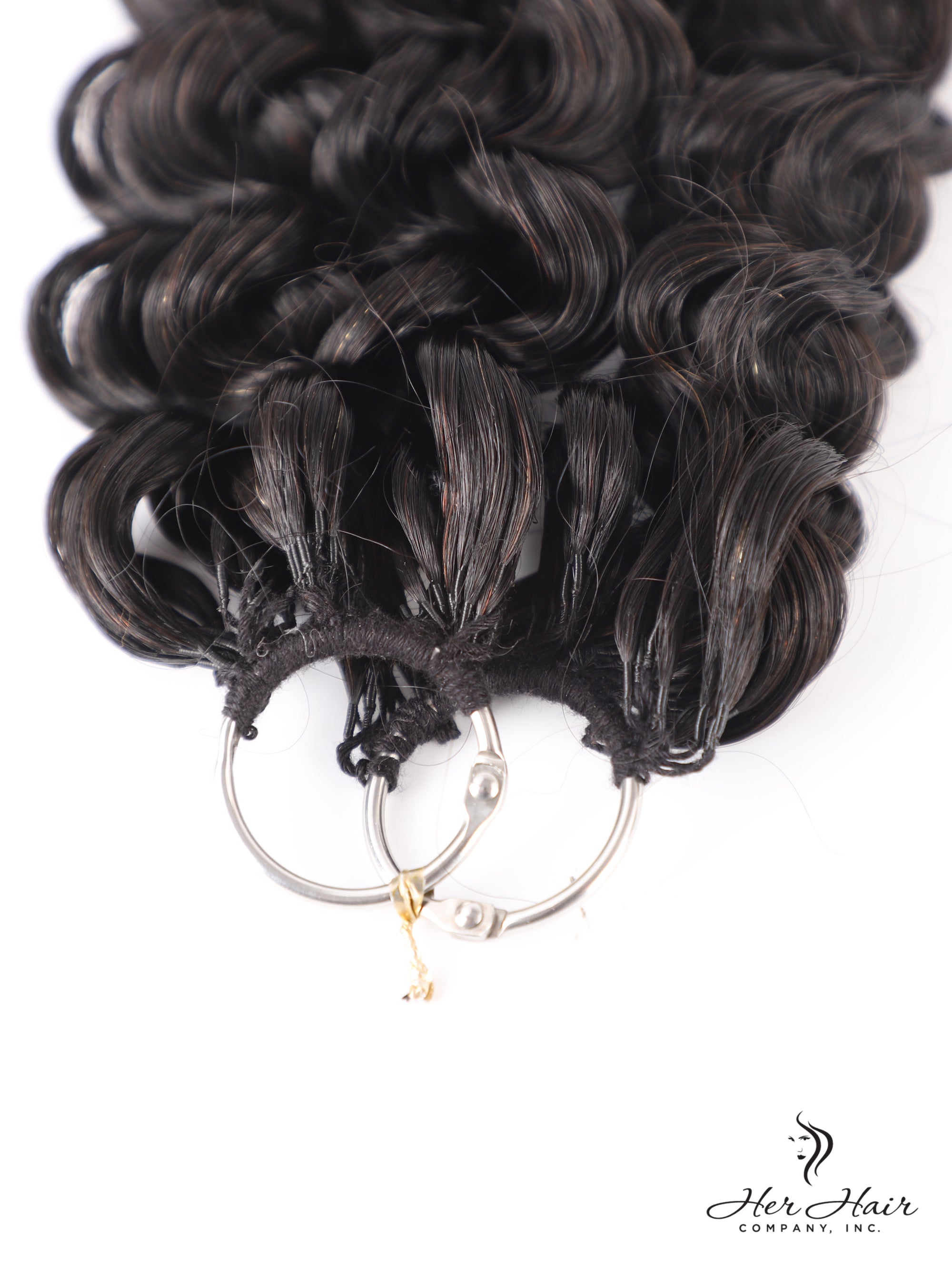 Deep curly crochet hair bundle by Her Hair Company, showing virgin standard bundle with tightly coiled curls.