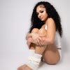 Brazilian Water Wave hair bundles from Her Hair Company, natural-looking Virgin Hair with a stylish water wave texture.