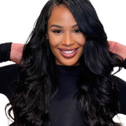 Burmese raw loose deep wave hair in four bundles from Her Hair Company, showing the natural wavy texture and bundle arrangement.