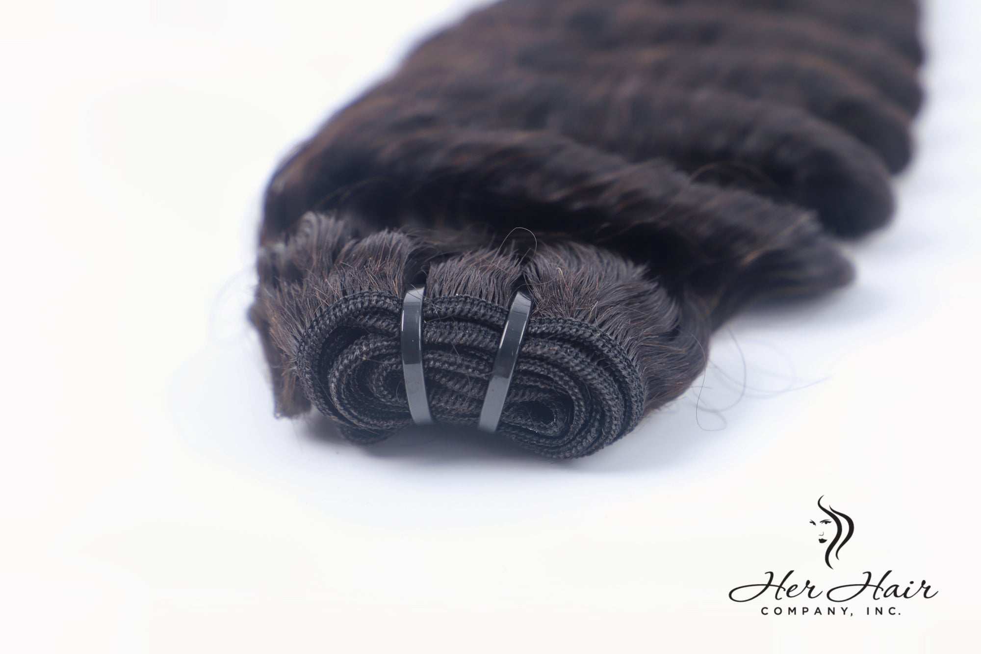 Burmese raw deep wave hair bundle from Her Hair Company, showing the natural textured deep wave style and rich color.