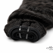Three bundles of Burmese Raw Deep Wave hair from Her Hair Company, showing curly, textured hair in 16, 18, and 20-inch lengths.