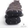 Burmese raw loose deep wave hair in three bundles from Her Hair Company, showing the natural deep wave texture and bundle arrangement.