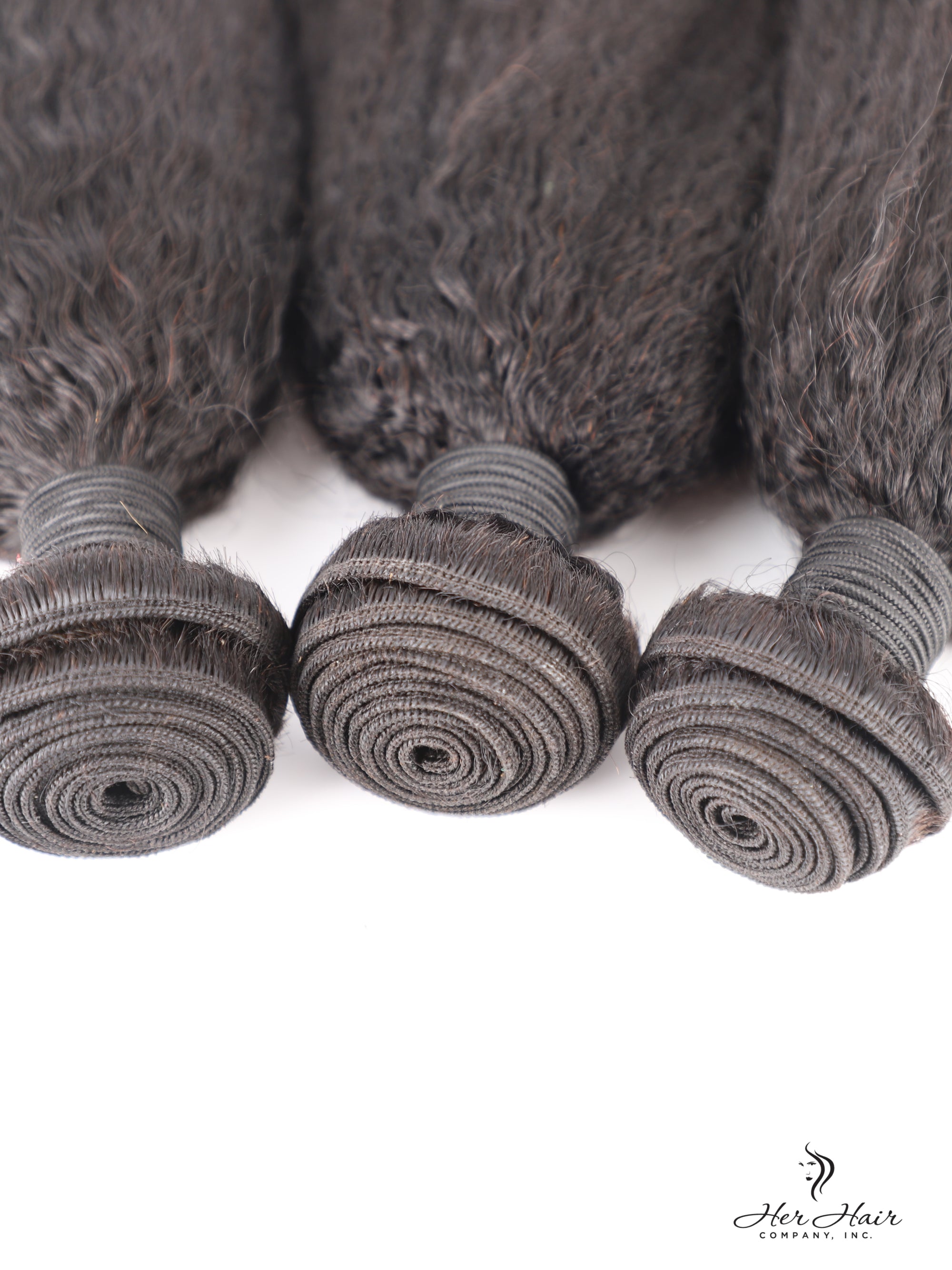 Brazilian kinky straight hair bundle by Her Hair Company, showing natural virgin kinky straight hair with a smooth, full texture.