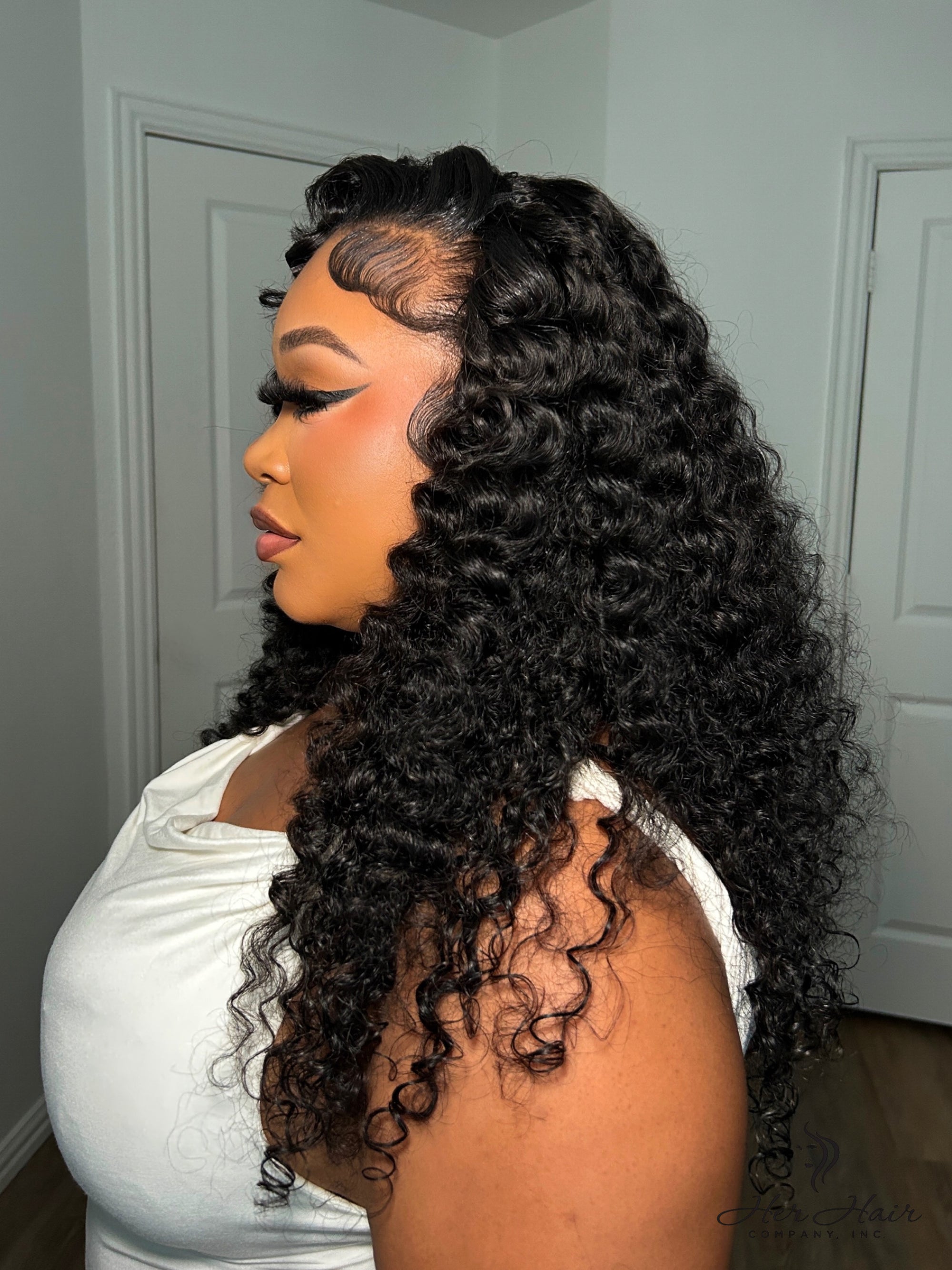 Brazilian Water Wave hair bundle by Her Hair Company, showing a full, natural water wave texture on a standard bundle.