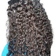 Burmese raw wavy hair bundle from Her Hair Company Standard Bundle collection, showing four natural wavy hair bundles.