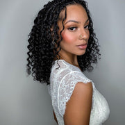 Deep curly bulk hair bundle from Her Hair Company, natural dark brown, full volume, and textured for versatile styling.