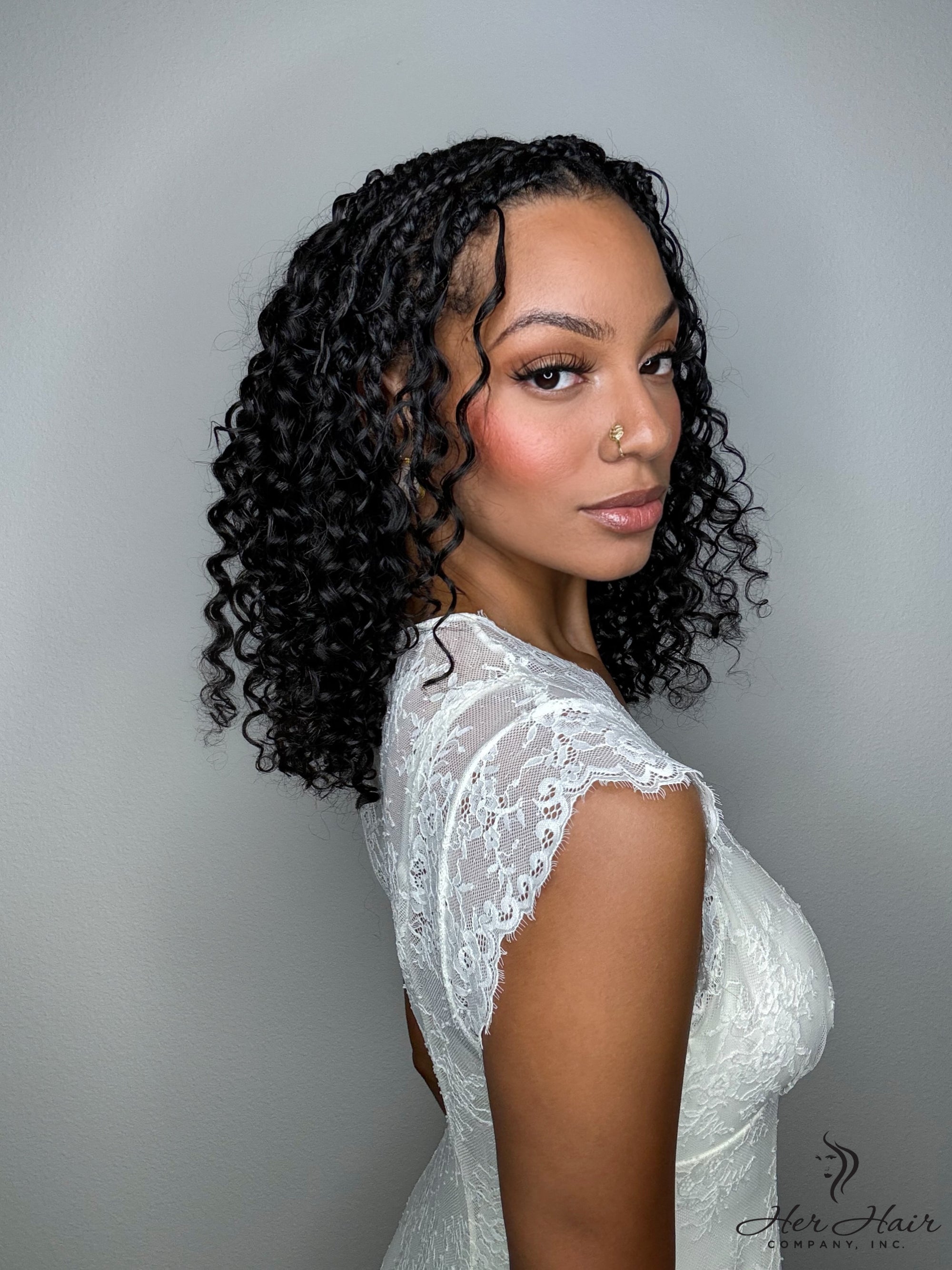 Deep curly bulk hair in a standard bundle from Her Hair Company, showcasing rich, voluminous natural curls.