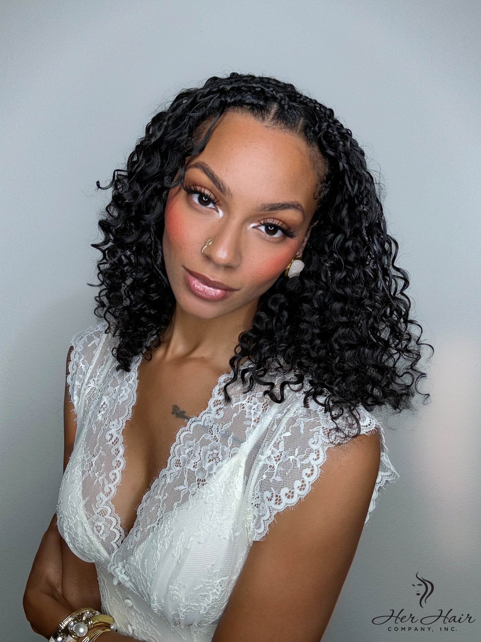Deep curly bulk hair from Her Hair Company, standard bundle with rich, voluminous curly strands suitable for hair extensions or weaves.