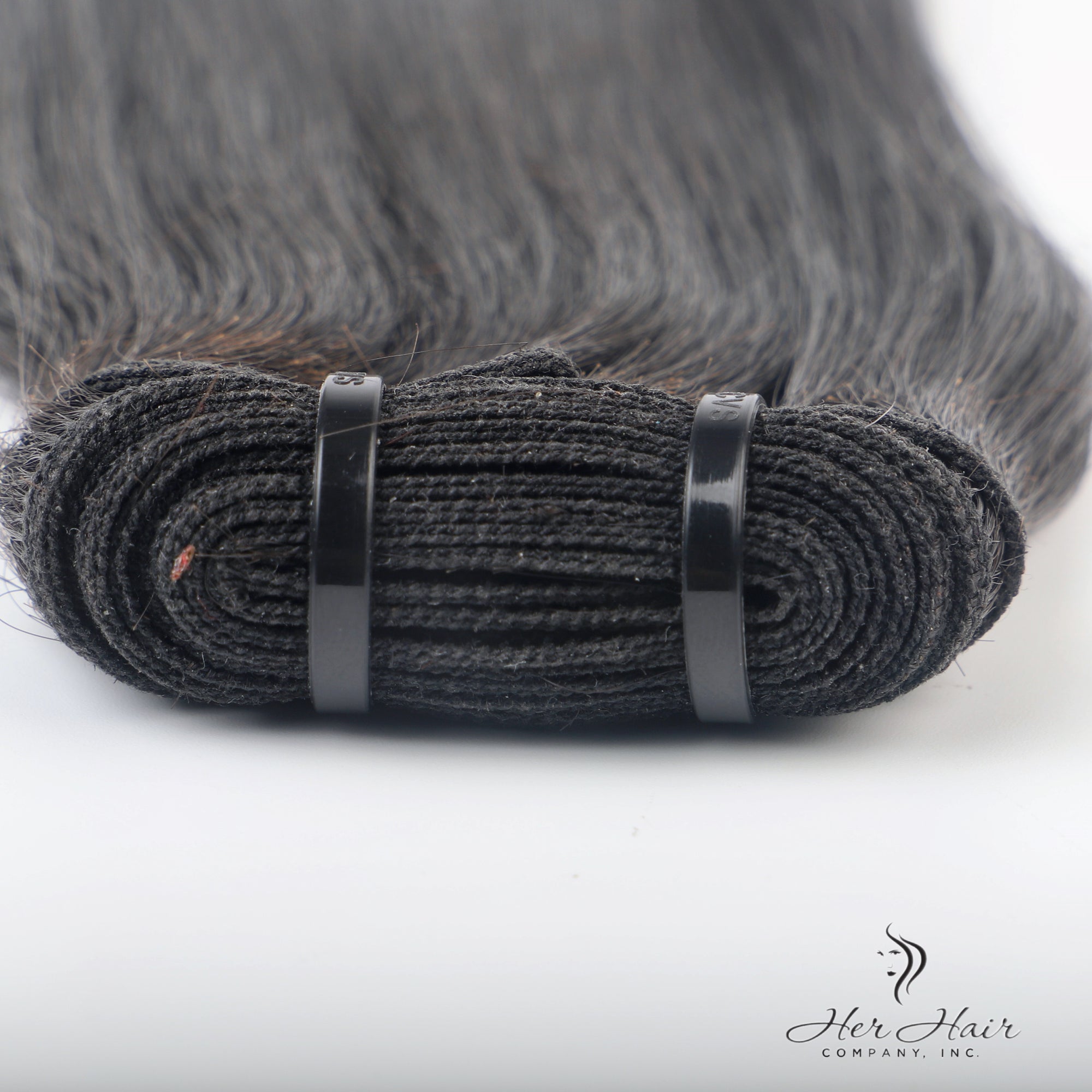 Brazilian Double Drawn Hair bundle from Her Hair Company, showing silky, full, and natural-looking hair strands.
