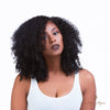 Brazilian kinky curly 4x4 HD lace closure from Her Hair Company, showcasing natural textured hair with lace front, styled for a seamless look.