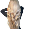 Three bundles of Brazilian 613# virgin hair from vendor-unknown, neatly arranged in a standard bundle set.