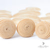 Four bundles of Brazilian 613# hair in a standard bundle pack, showcasing light blonde, silky, and straight hair strands.