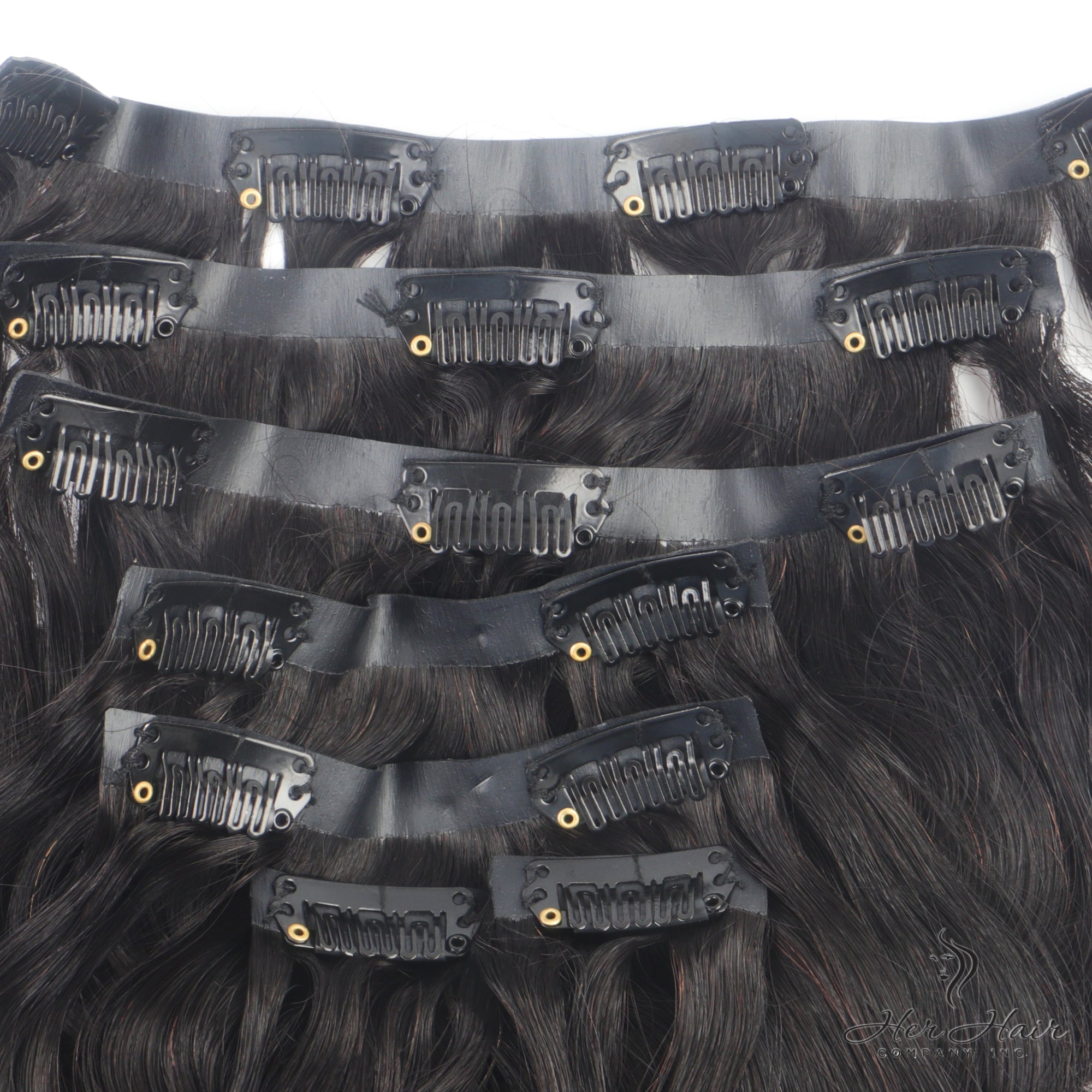 Brazilian clip-in hair extensions, standard bundle, with natural dark brown straight hair and seamless clip attachments.