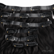 Brazilian clip-in hair extensions in a standard bundle with 16-inch body wave, natural-looking hair for versatile styling.
