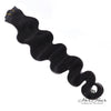 Brazilian clip-in hair extensions, standard bundle, with dark brown to black shades, styled in smooth, straight hair.