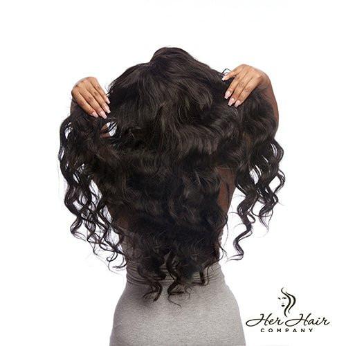 Brazilian Body Wave 4x4 HD lace closure from Her Hair Company, showing the natural wave pattern and HD lace detail.
