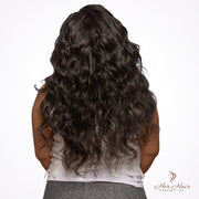 Brazilian wavy hair bundle from Her Hair Company, showing a full, natural-looking wavy hair extension in a standard bundle.