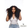 Brazilian deep curly hair bundle from Her Hair Company, showing thick, voluminous curly hair with a natural shine.