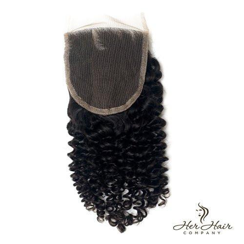 Brazilian kinky curly 4x4 HD lace closure from Her Hair Company, showing textured curly hair with lace front for natural look.