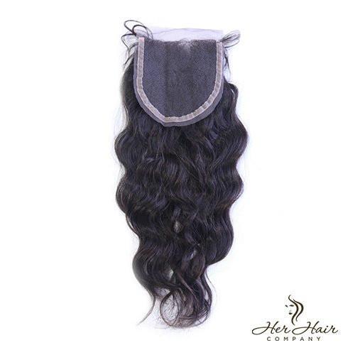 Brazilian wavy 4x4 HD lace closure from Her Hair Company, showcasing the realistic lace and wavy hair texture.
